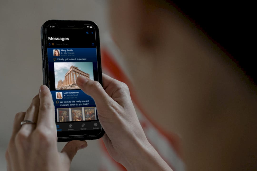Hands holding iPhone